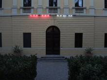 Villa Façade with Flashing Light Bulbs
